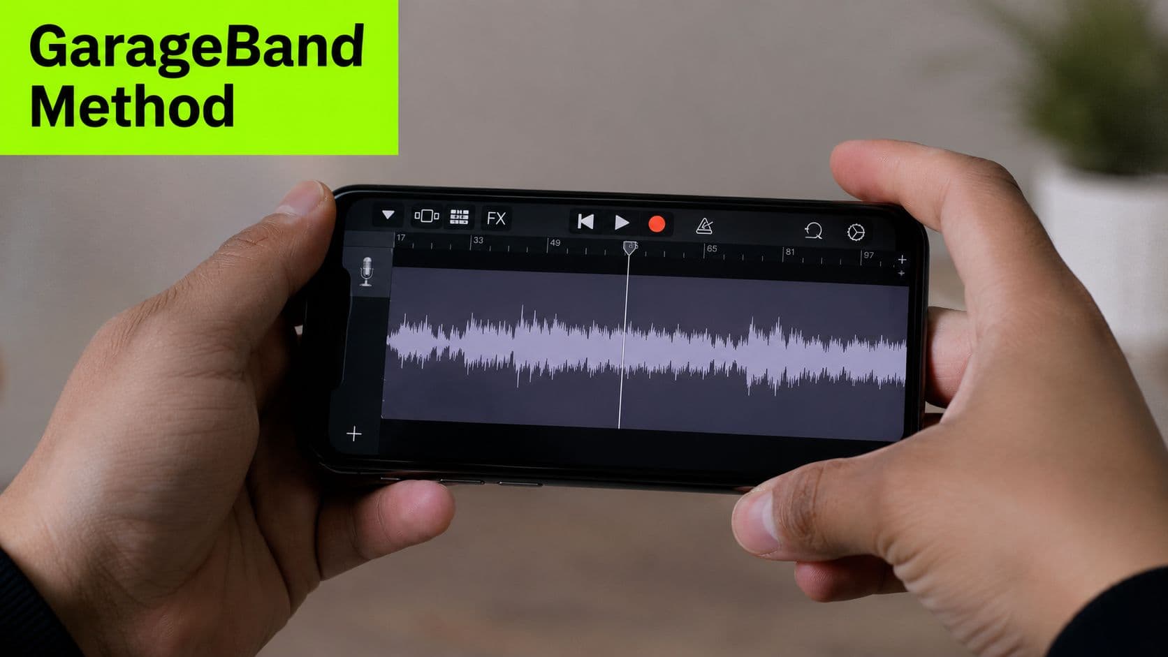 A person holding a smartphone showing an audio waveform editing screen in the GarageBand mobile application interface.