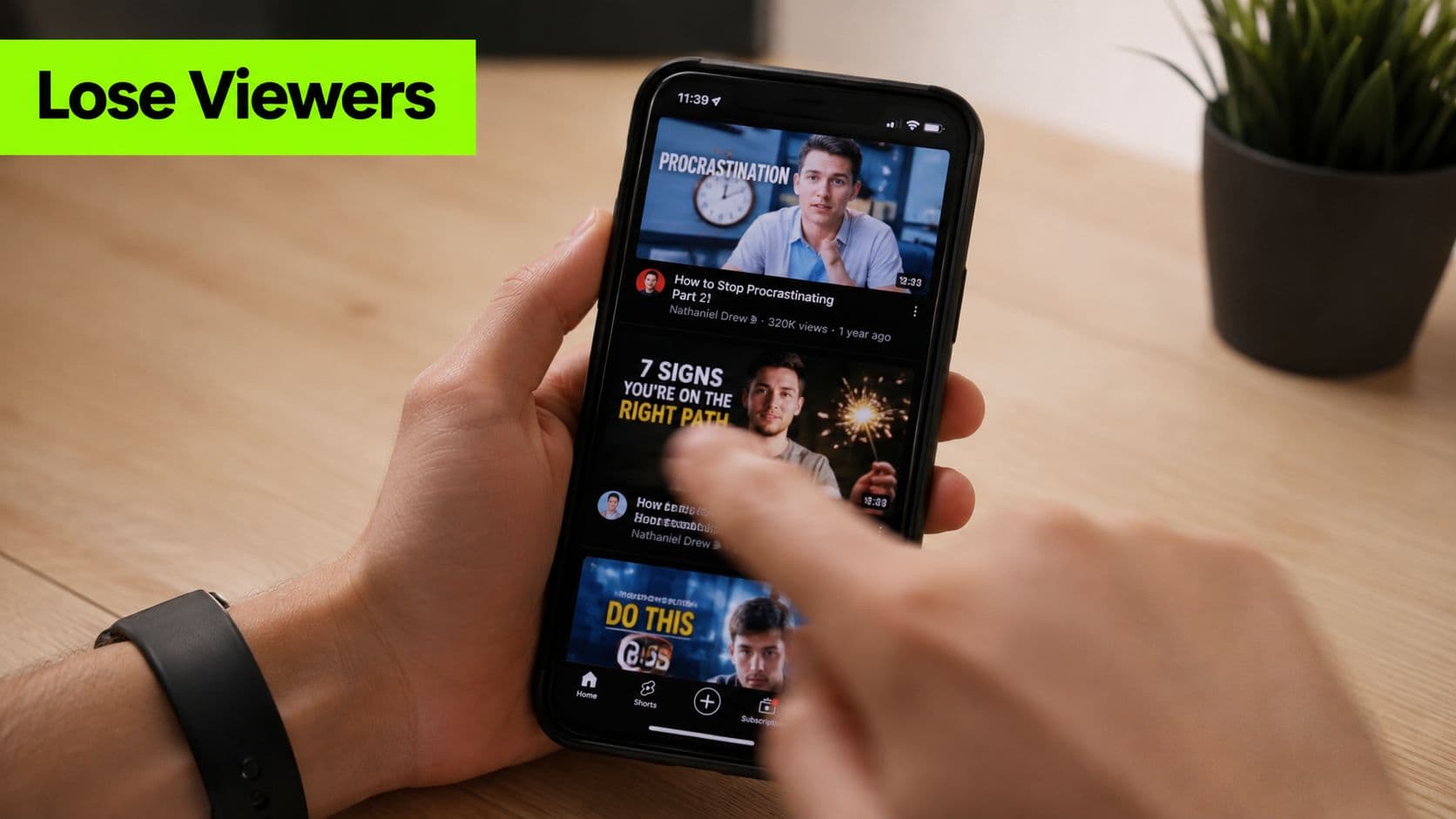 A person scrolling through YouTube videos on their smartphone, focusing on educational content and creator-focused thumbnails.