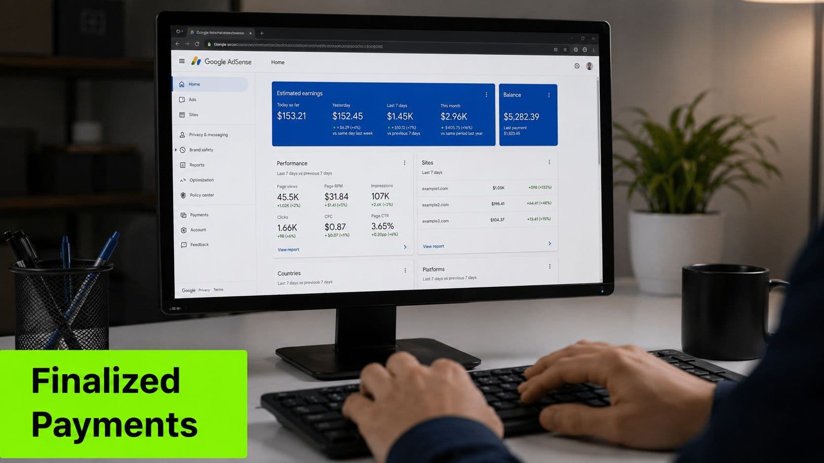A person working at a computer screen showing a Google AdSense dashboard with earnings and payment information.