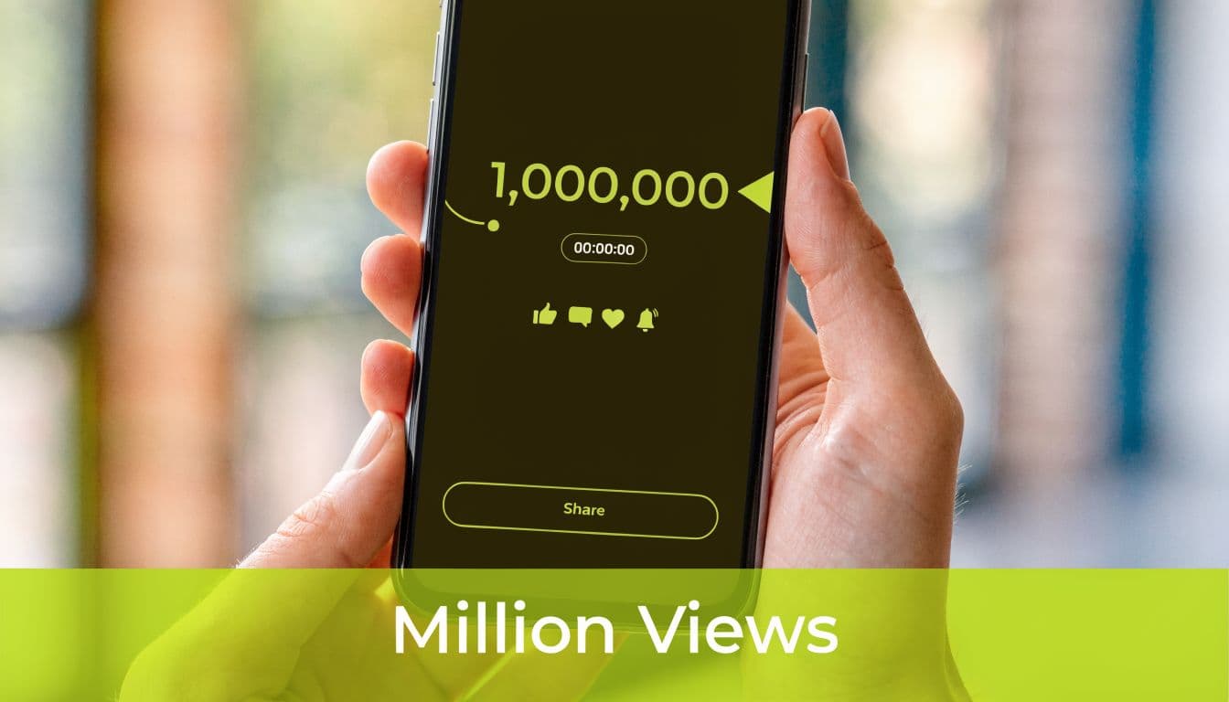 A close-up of a person holding a smartphone showing a million views milestone screen on a social platform.